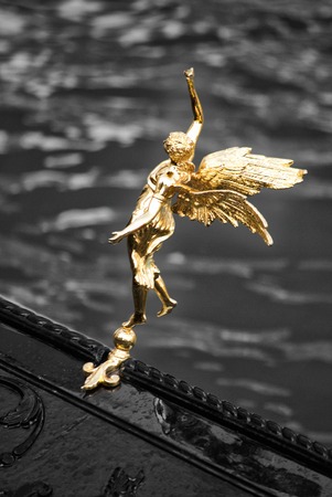 Traditional wooden boat Gondola in Venice close up and detailの写真素材