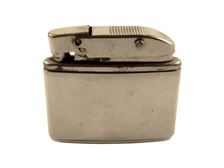 Vintage cigarette lighter isolated on white backgroundの写真素材