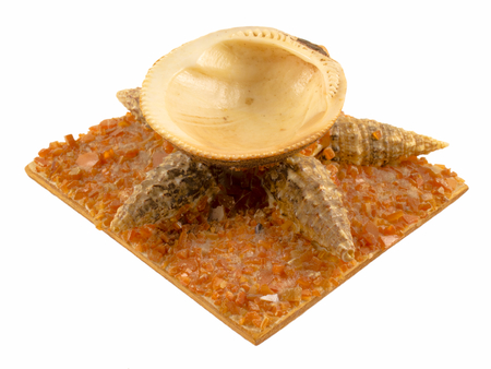 Folk art made from sea shells. Isolated on white background.の写真素材