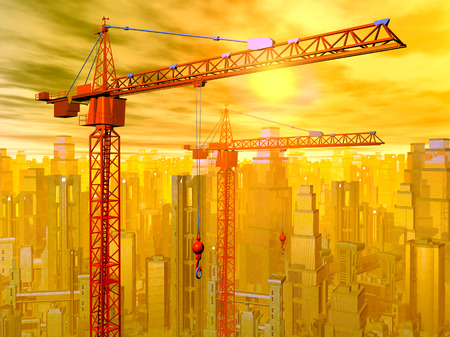 Construction cranes in front of a city landscapeの写真素材