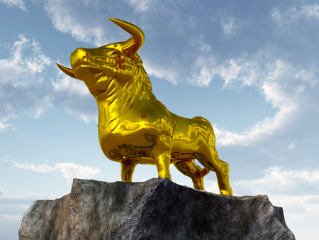 Golden calf on a rockの写真素材