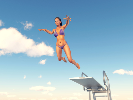 Woman jumping from a diving boardの写真素材