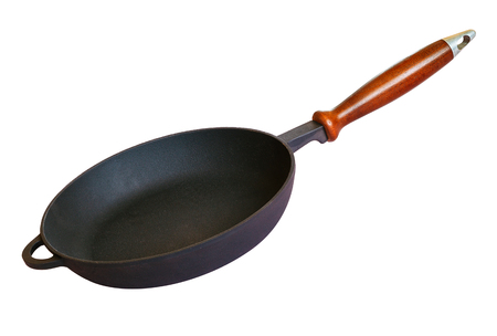 Frying cast-iron pan skillet isolated on white backgroundの写真素材