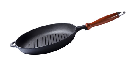 Frying cast-iron grill pan skillet isolated on white backgroundの写真素材