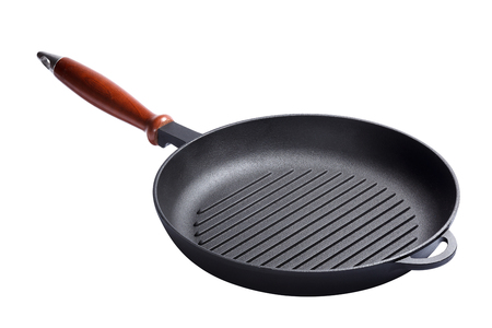 Frying cast-iron grill pan skillet isolated on white backgroundの写真素材