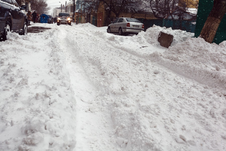 Winter street with lots of snow in Odessaの写真素材