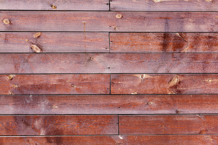 Rough pine red boards of wooden backgroundの写真素材