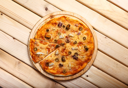 Seafood pizza with shrimps, mussels and olivesの写真素材