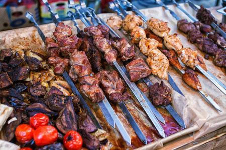 Barbecue Roasted Meat Shish Kebabs With Pepper and Onions On The Hot Grill. Good Snack For Outdoor Autumn Barbecue Party Or Picnicの写真素材