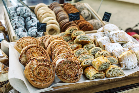 Assorted homemade nut rolls pastry on tableの写真素材