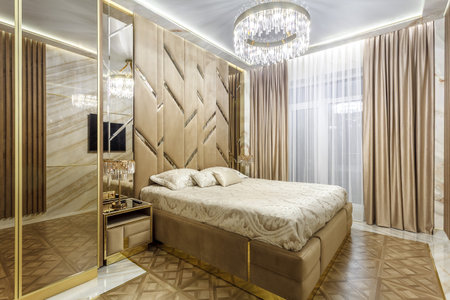 Luxury bedroom interior with parquet and mirror wallsの写真素材