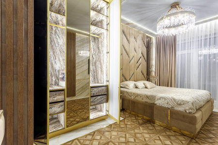 Luxury bedroom interior with parquet and mirror wallsの写真素材