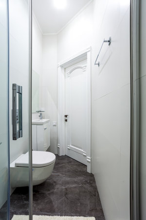 Contemporary small bathroom interior design. Glass shower cabinの写真素材
