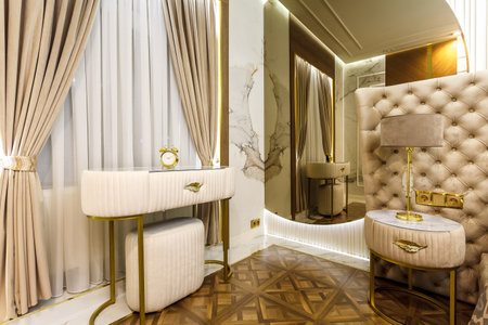 Luxury Interior Primary Bedroom Detail of Headboard and Bedding.の写真素材