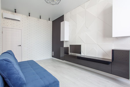 light Living room with 3D Embossed Decorative Wall Panel with White and blue sofaの写真素材