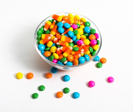 Colored candy inside glass bowl