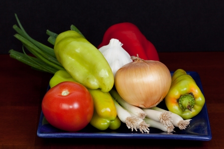 Vegetables  on blue plateの写真素材