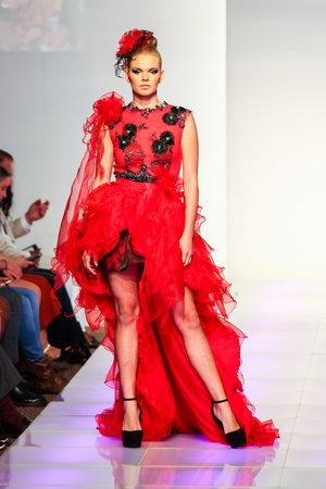 NEW YORK - SEPTEMBER 13: A model walks the runway at the Jossie Medina 2015 collection  during the 22nd season of Couture Fashion Week in New York on September 13, 2015.のeditorial素材