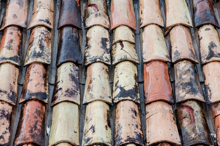 Wet red roof backgroundの写真素材
