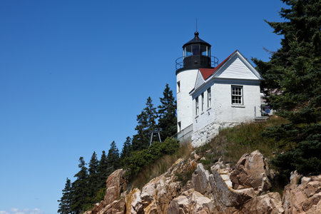 BASS HARBOR-AUGUST 07: Bass Harbor Lighthouse overlooking Atlantic Ocean in Maine, USA on August 07, 2010.のeditorial素材