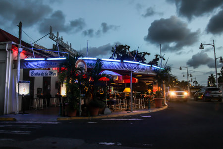 MARIGOT, ST.MARTIN - JULY 31:  Evening atmosphere with lights from Bistro de la Mar and street in Marigot in July 31, 2015 in St.Maarten, Caribbean Island.のeditorial素材