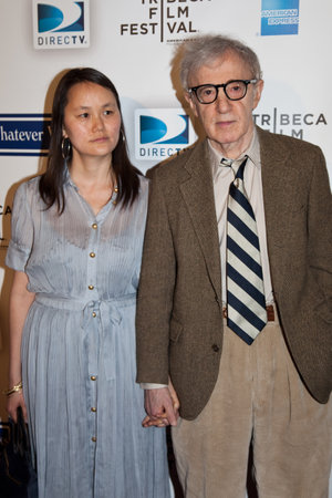 NEW YORK - APRIL 22: Director Woody Allen (R) and Soon-Yi Previn attend the premiere of 'Whatever Works' during the 2009 Tribeca Film Festival at Ziegfeld Theatre on April 22, 2009 in New York City.のeditorial素材