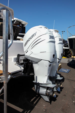 NORWALK, CT, USA - SEPTEMBER 19, 2019: Axopar 37 Cabin egines close up shoving on Progressive...