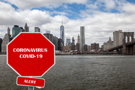 NEW YORK - APRIL 8, 2016: Coronavirus COVID-19 illustrative sign digitaly added to NYC image. View from Manhattan near Brooklyn Bridge with Manhattan bridge included.のeditorial素材