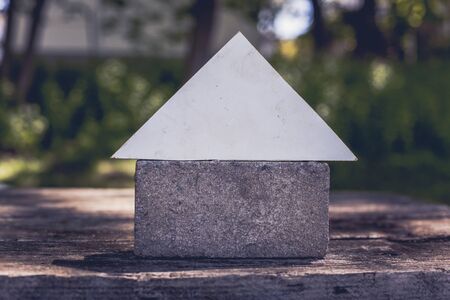 Brick with wood  looks like house outdoor on tableの写真素材