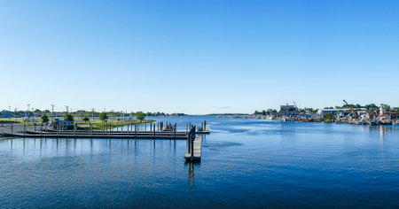 NORWALK, CT, USA -MAY 31, 2020:  Panoramic view from the bridge at South Norwalk in the beautiful sunny morning with clear blu skyのeditorial素材