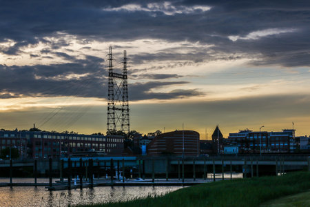 NORWALK, CT, USA -JUNE 19, 2020: Evening view  with sunset and clouds from Veteran"s Park near downtown.のeditorial素材