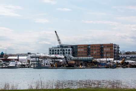 NORWALK, CT,USA  - APRIL 14, 2021:  View from Veterans Park in cloudy day with new building facade...