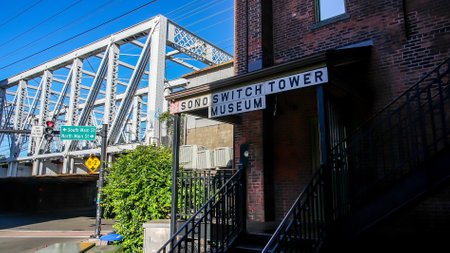 NORWALK, CT, USA - SEPTEMBER 2, 2021: SONO switch tower museum on Washington Street  in downtown with railroad bridgeのeditorial素材