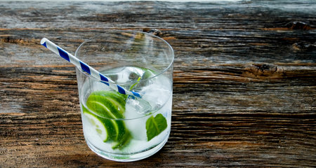 Gin and Tonic drink on wooden tableの写真素材