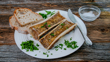 Roasted marrow bones on rustic tableの写真素材