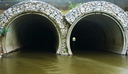 River pipes under the roadの写真素材