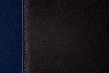 leather background segmented on two parts, black and blue