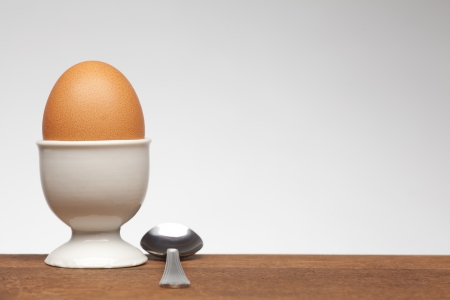 white egg cup on white background with empty space on right sideの写真素材