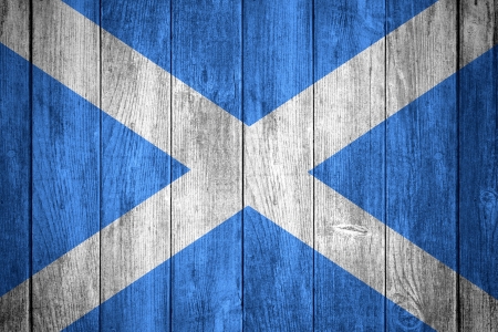 Flag of Scotland or blue and white Scoittish banner on wooden backgroundの写真素材