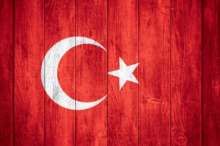 flag of Turkey or red and white Turkish banner on wooden backgroundの写真素材