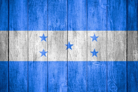 flag of Honduras or banner on wooden backgroundの写真素材