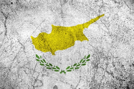 flag of Cyprus or Cypriot banner on rough pattern backgroundの写真素材