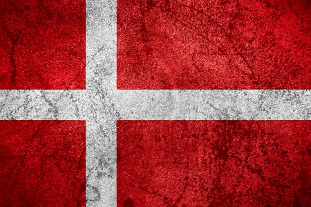 flag of Denmark or Danish banner on rough metal backgroundの写真素材