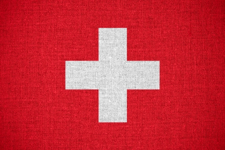 flag of Switzerland or  Swiss banner on canvas backgroundの写真素材