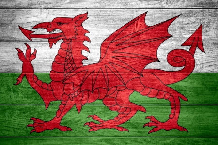 flag of Wales or Welsh banner on wooden backgroundの写真素材