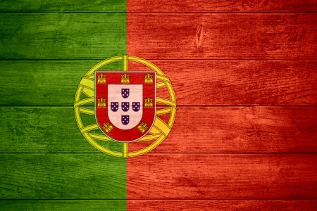 flag of Portugal or Portuguese banner on wooden backgroundの写真素材