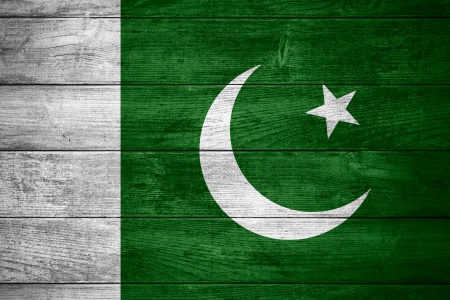 flag of  Pakistan or  Pakistani banner on wooden backgroundの写真素材
