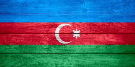 flag of  Azerbaijan or  Azerbaijani banner on wooden backgroundの写真素材