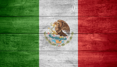 flag of Mexico or Mexican banner on wooden backgroundの写真素材