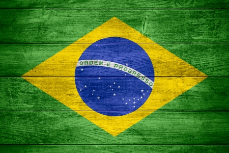 flag of  Brazil or  Brazilian banner on wooden backgroundの写真素材